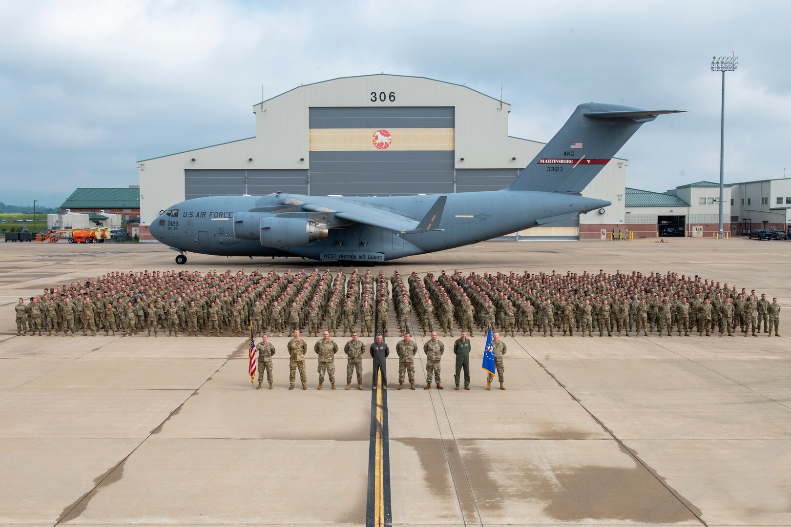 The Airmen of the 167th Airlift Wing stand in formation in front of one of the wing’s eight C-17 Globemaster III aircraft at Shepherd Field, Martinsburg W.Va., June 13, 2022. The photo concluded an extended unit training assembly.
