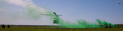 U.S. Marines with Marine Light Attack Helicopter Squadron 773 (HMLA 773), Marine Aircraft Group 49, Marine Forces Reserve, secure the perimeter before boarding a UH-1Y Venom during the New Orleans Air Show at Naval Air Station Joint Reserve Base New Orleans, LA, March 19, 2022.