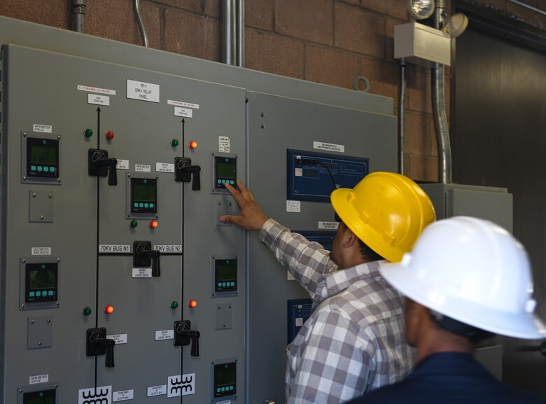 Mr. Volkmer Garcia, electrical engineering technician, assigned to the 30th Civil Engineer Squadron, inspects a panel inside substation N on Vandenberg Space Force base, Calif., June 2, 2022. . Airmen and civilians assigned to the 30th Civil Engineer Squadron, along with contractors, successfully routed power to substation N, re-energizing south loop two. (U.S. Space Force photo by Airman 1st Class Ryan Quijas)
