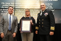IMAGE: Kimberly Wright receives the Navy Meritorious Civilian Service Award at the 2021 Naval Surface Warfare Center Dahlgren Division (NSWCDD) Honorary Awards ceremony, June 17. Standing left to right: NSWCDD Technical Director, Dale Sisson, SES, Wright and NSWCDD Commanding Officer, Capt. Philip Mlynarski.