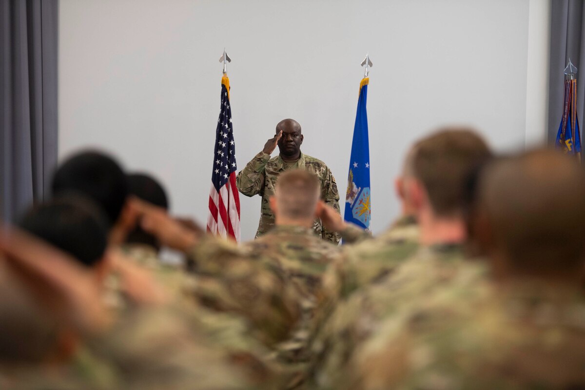 Lt. Col. Schneider Rislin, outgoing 436th Security Forces Squadron commander, receives a final salute from his unit during a change of command ceremony held at The Landings on Dover Air Force Base, Delaware, June 21, 2022. Rislin will be taking on the role of 436th MSG deputy commander. (U.S. Air Force photo by TSgt. J.D. Strong II)