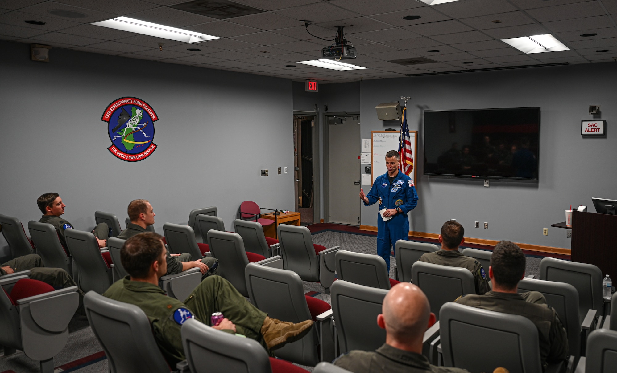 U.S. Army Col. Andrew Morgan, NASA astronaut and Army NASA Detachment commander, briefs 509th Bomb Wing B-2 Spirit pilots at Whiteman Air Force Base, Missouri, June 7, 2022. Members of NASA were invited to participate in cross-organizational communications with members of the 509th BW, to learn how NASA and B-2 Spirit training overlap.