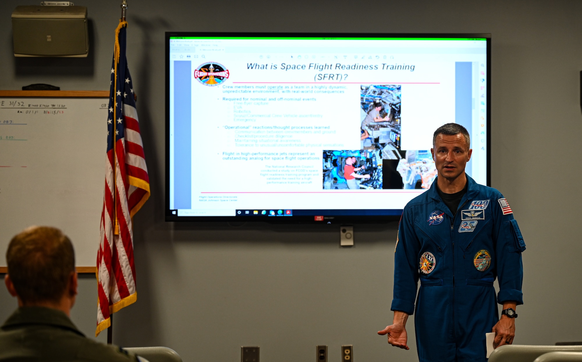 U.S. Army Col. Andrew Morgan, NASA astronaut and Army NASA Detachment commander, briefs 509th Bomb Wing B-2 Spirit pilots at Whiteman Air Force Base, Missouri, June 7, 2022. Members of NASA were invited to participate in cross-organizational communications with members of the 509th BW, to learn how NASA and B-2 Spirit training overlap.