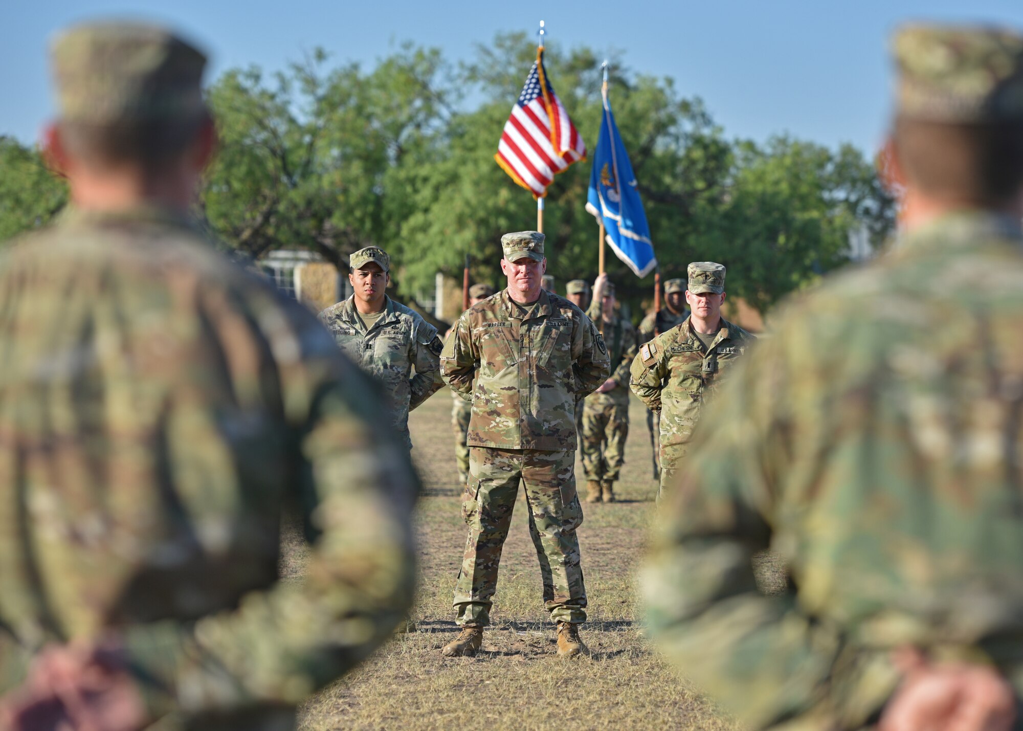 U.S. Army Maj. Donald Barger, 344th Military Intelligence Battalion executive officer, stands at parade rest during the 344th MI BN change of command ceremony at Fort Concho, San Angelo, Texas, June 21, 2022. Barger was responsible for facilitating and overseeing the change of command. (U.S. Air Force photo by Senior Airman Ashley Thrash)