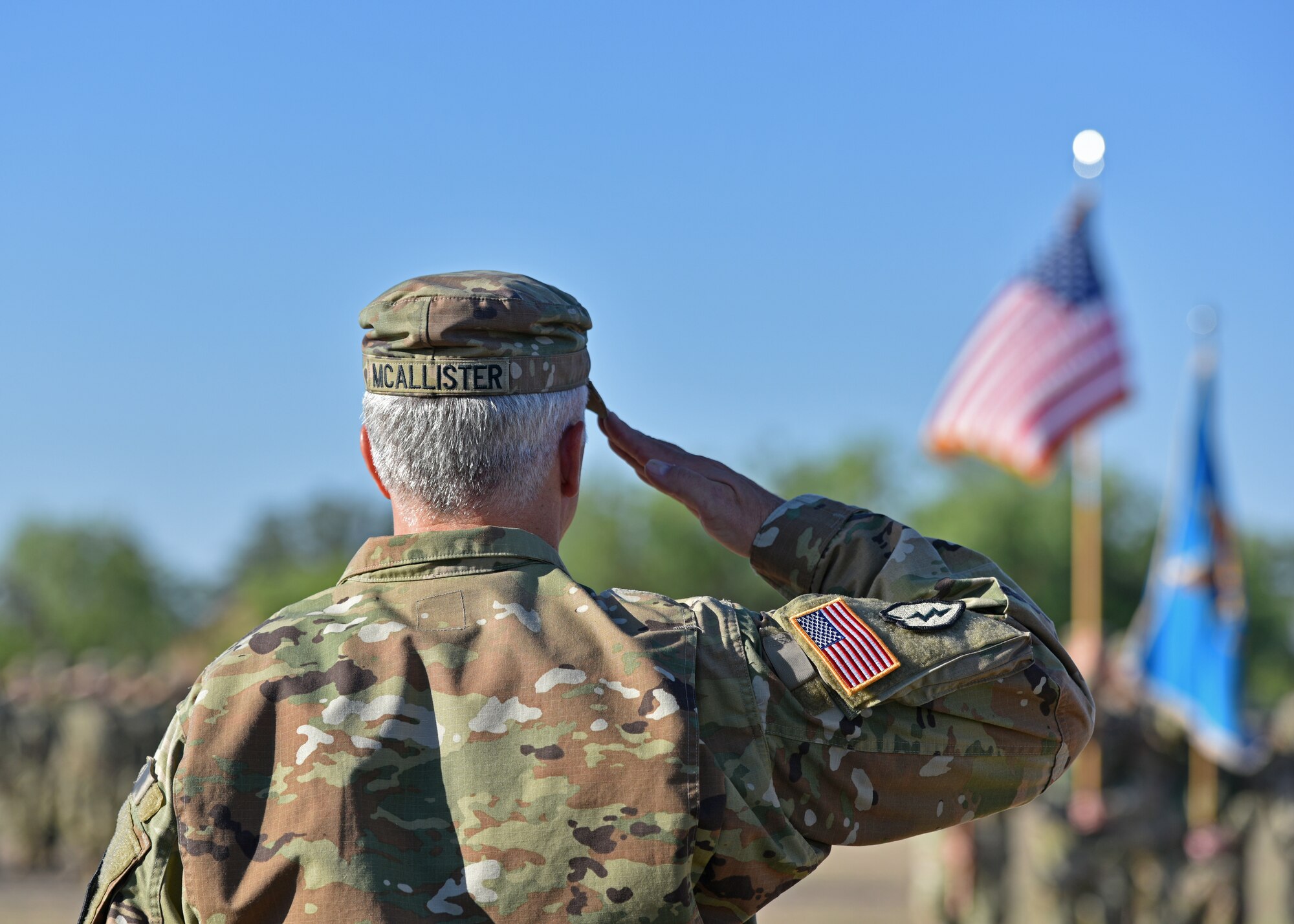 U.S. Army Lt. Col. John McAllister, incoming 344th Military Intelligence Battalion commander, salutes the flag during the 344th MI BN change of command ceremony at Fort Concho, San Angelo, Texas, June 21, 2022. McAllister was previously stationed at Fort Hood, Texas. (U.S. Air Force photo by Senior Airman Ashley Thrash)