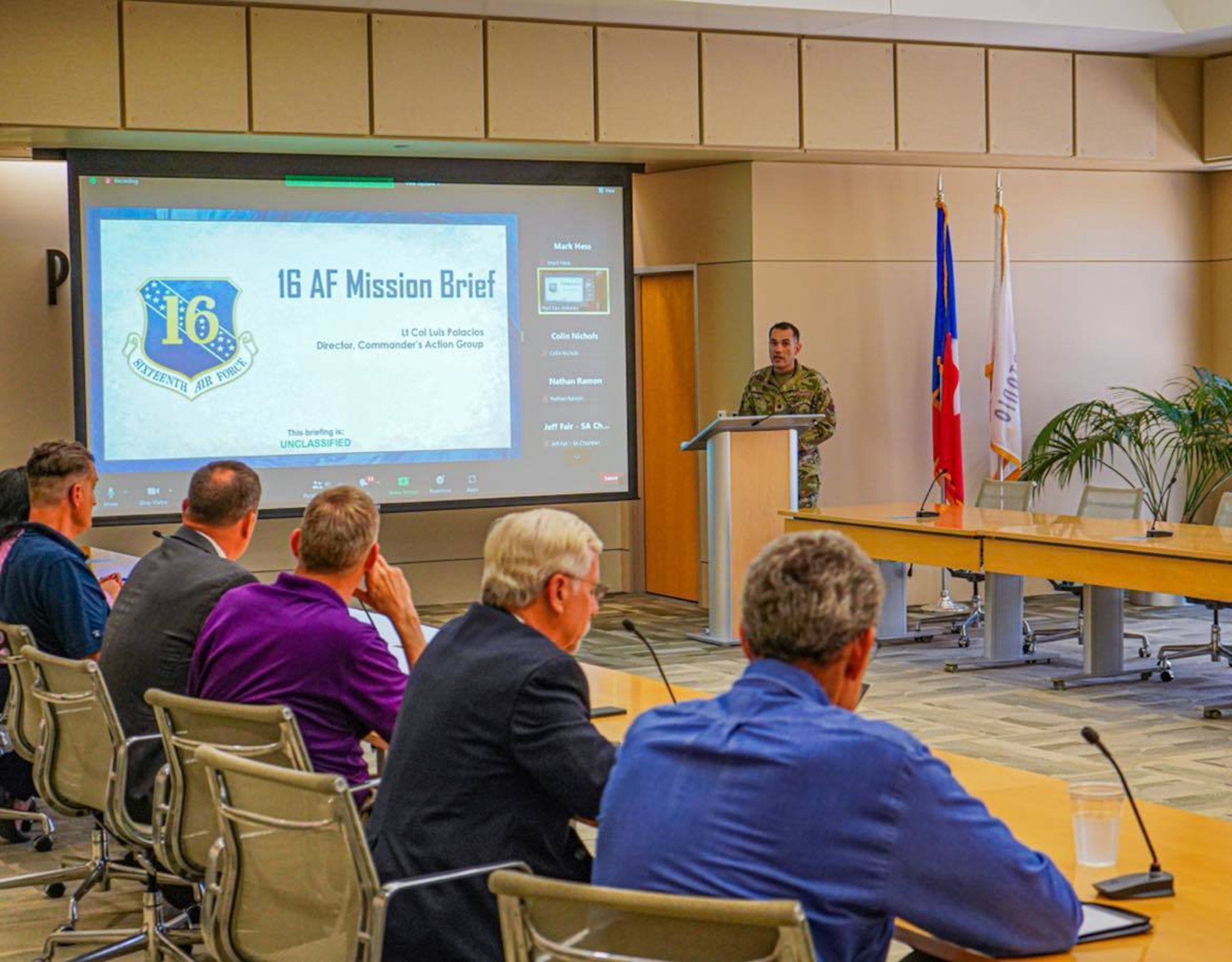 Lt. Col. Luis Palacios, Director of Commander’s Action Group, 16th Air Force (Air Forces Cyber) provides a mission brief at the San Antonio Chamber’s Cybersecurity and Military Affairs Councils joint meeting at Port San Antonio, Texas, June 1.