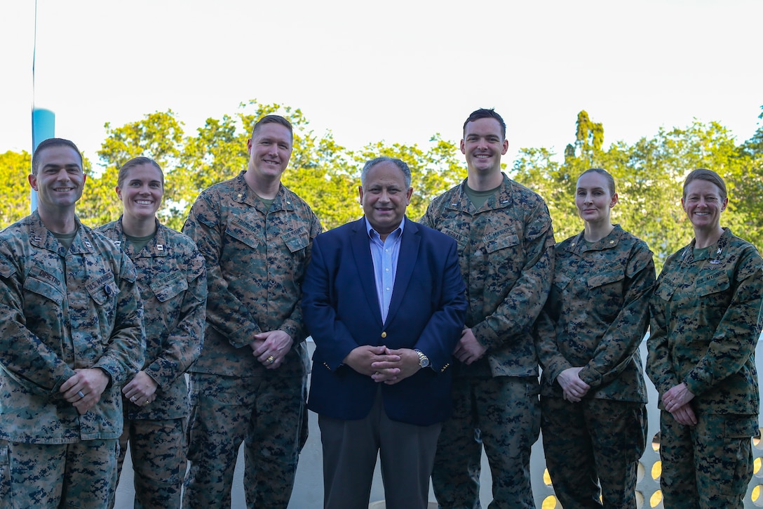 U.S. Secretary of the Navy Carlos Del Toro, U.S. Naval Academy class of 1983, stands with the U.S. Naval Academy graduates with the Command Element, Marine Rotational Force-Darwin (MRF-D) 22, during a visit with MRF-D 22 at Larrakeyah Defence Precinct, NT, Australia, June 18, 2022. Secretary Del Toro visited Marines and Sailors with MRF-D 22 and Australian Defence Force personnel as part of the Indo-Pacific battlefield circulation. (U.S. Marine Corps photo by Cpl. Emeline Molla)