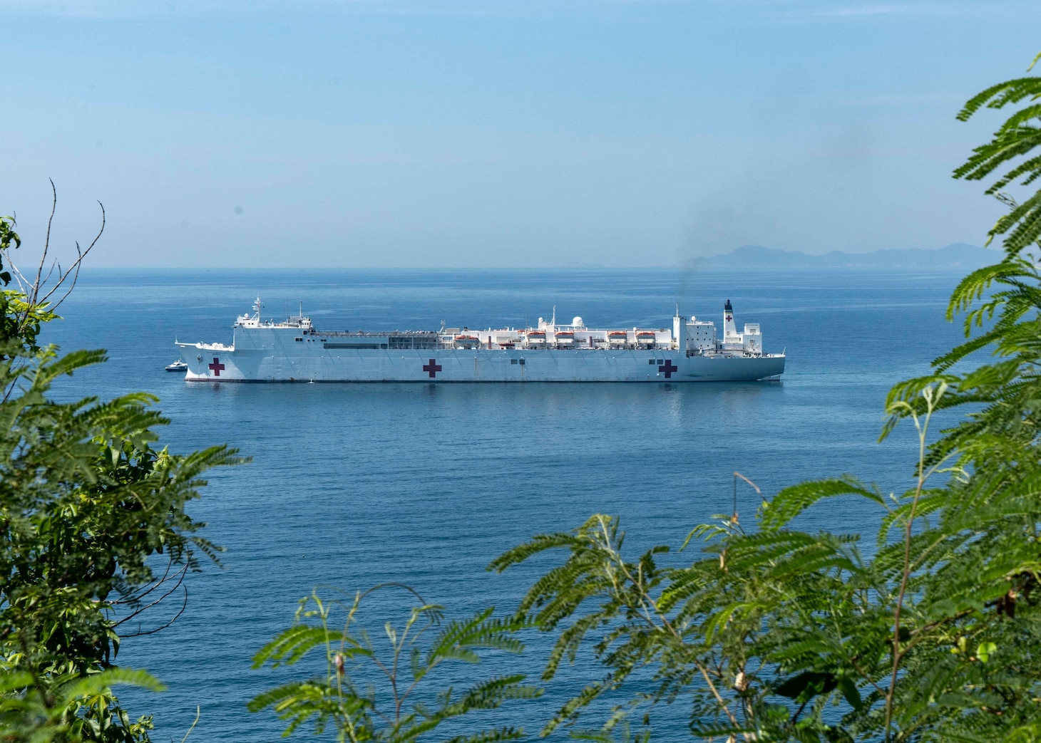 VUNG RO BAY, Vietnam (June 19, 2022) Hospital ship USNS Mercy (T-AH 19) arrives in Vung Ro Bay in the Phu Yen province of Vietnam for Pacific Partnership 2022, June 19. Now in its 17th year, Pacific Partnership is the largest annual multinational humanitarian assistance and disaster relief preparedness mission conducted in the Indo-Pacific. (U.S. Navy photo by Mass Communication Specialist 2nd Class Brandon Parker)
