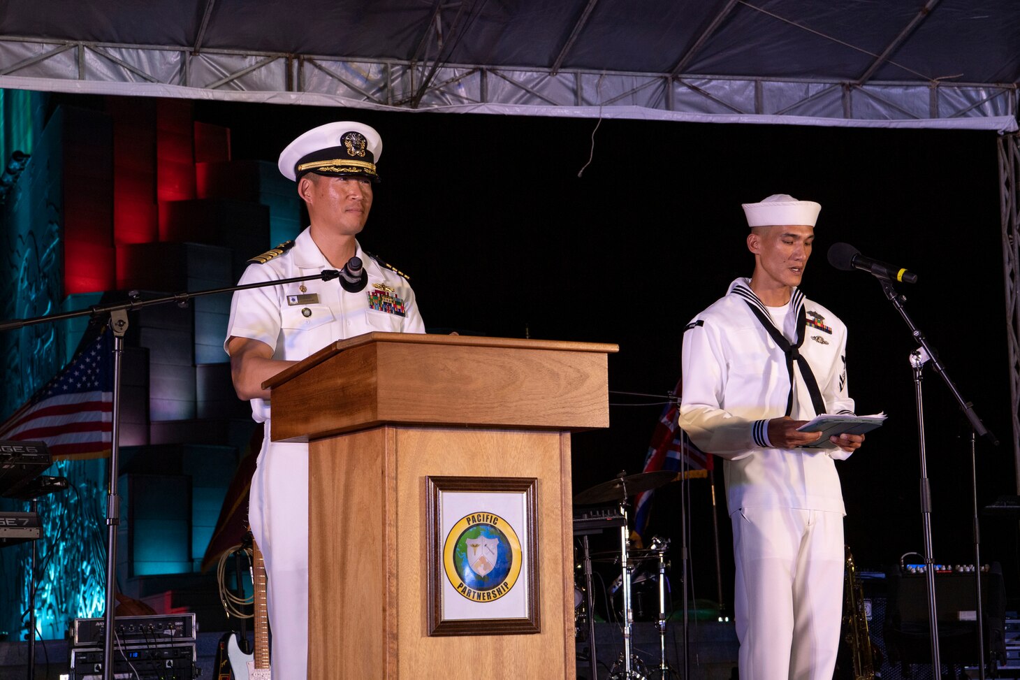 PHU YEN, Vietnam (June 20, 2022) – Capt. Hank Kim, Pacific Partnership 2022 mission commander, left, delivers remarks during the Pacific Partnership Vietnam opening ceremony. Now in its 17th year, Pacific Partnership is the largest annual multinational humanitarian assistance and disaster relief preparedness mission conducted in the Indo-Pacific. (U.S. Navy photo by Mass Communication Specialist 2nd Class Brandie Nuzzi)