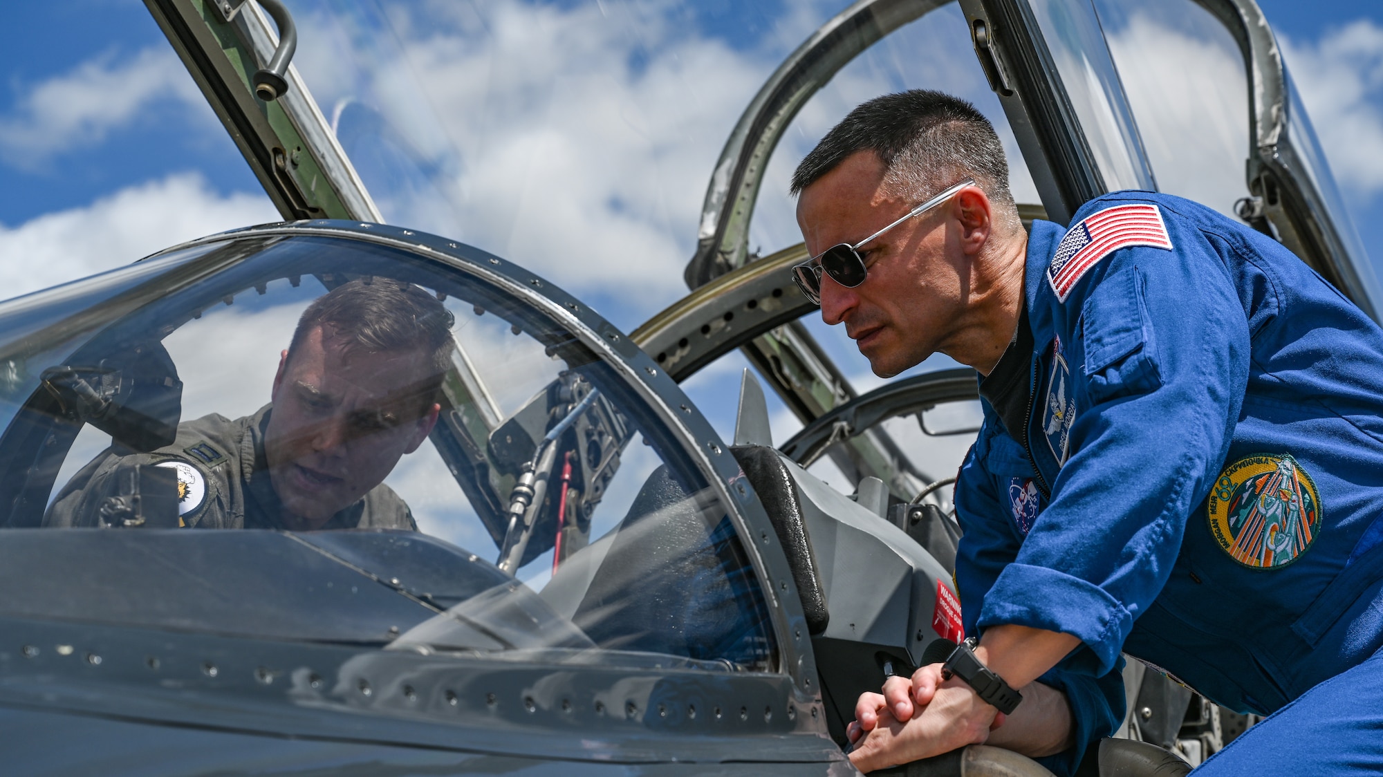 U.S. Army Col. Andrew Morgan, NASA astronaut and Army NASA Detachment commander and a B-2 Spirit pilot, discuss the T-38A Talon airframe at Whiteman Air Force Base, Missouri, June 7, 2022. NASA employs the T-38N Talon, which prepares astronauts and aircrews to respond to events that may jeopardize the mission. Both the 509th Bomb Wing and NASA utilize the trainer to ensure mission readiness.