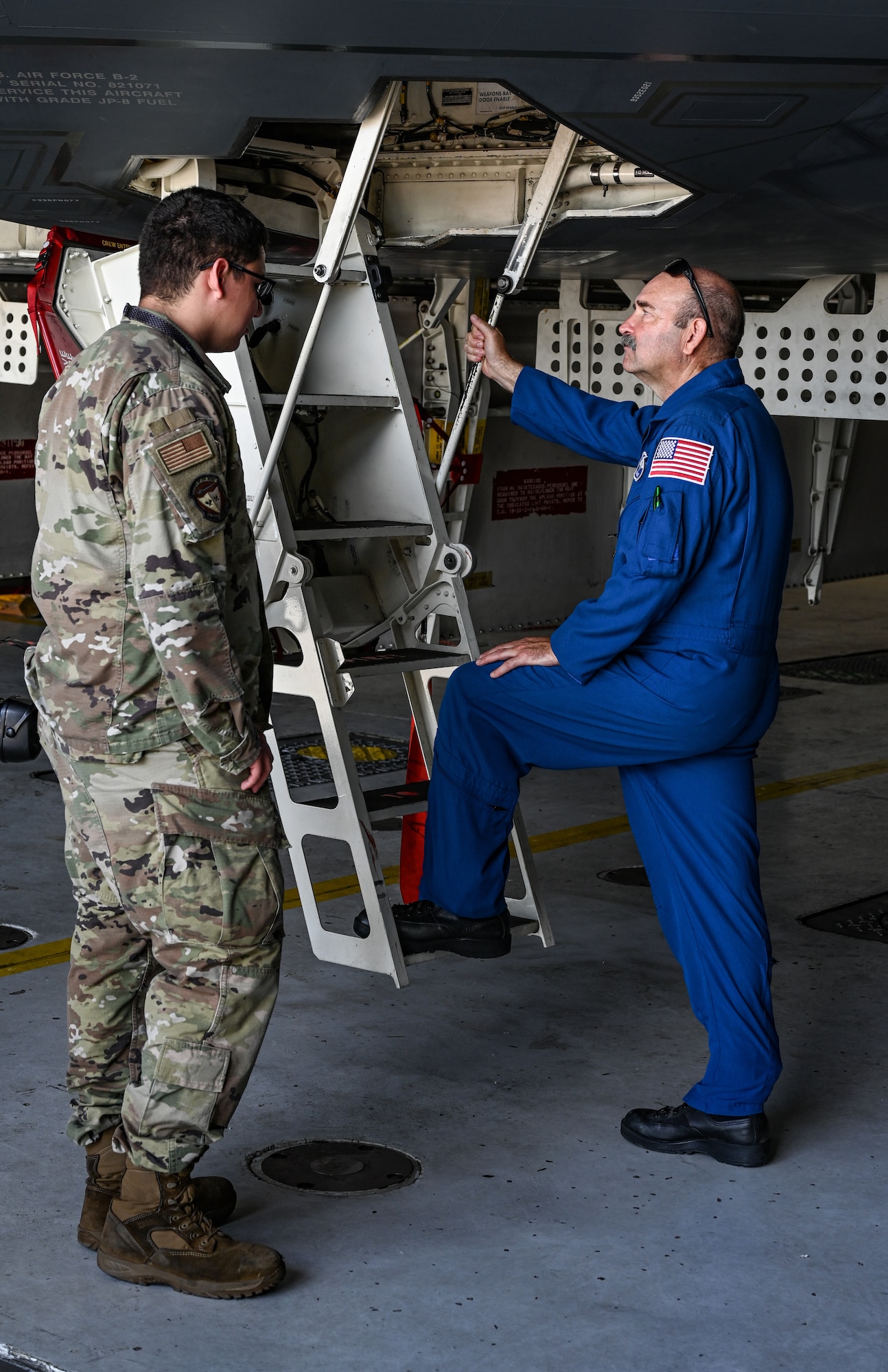 Tom Parent, NASA Aircraft Operations Division pilot and a U.S. Air Force B-2 Spirit crew chief, climb into the cockpit of the stealth bomber at Whiteman Air Force Base, Missouri, June 7, 2022. NASA and the 509th Bomb Wing engaged in cross-organizational communication, discussing common mission components between the two organizations. Finding new ways to enhance current partnerships ensures innovation and growth, allowing men and women of the 509th BW to maintain the most lethal combat force in the world.