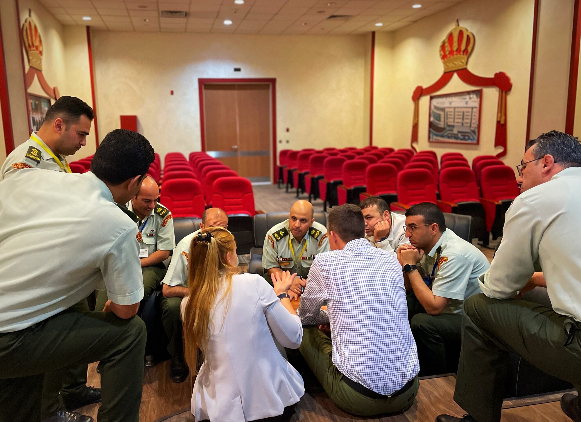 Jordanian Royal Medical Service doctors exchange ideas with Lt. Cmdr. Taylor DesRosiers, Walter Reed Medical Center critical care fellow, and Lt. Col. Erik DeSoucy, Brooke Army Medical Center inside the King Hussein Medical Center May 11, 2022 in Amman, Jordan.