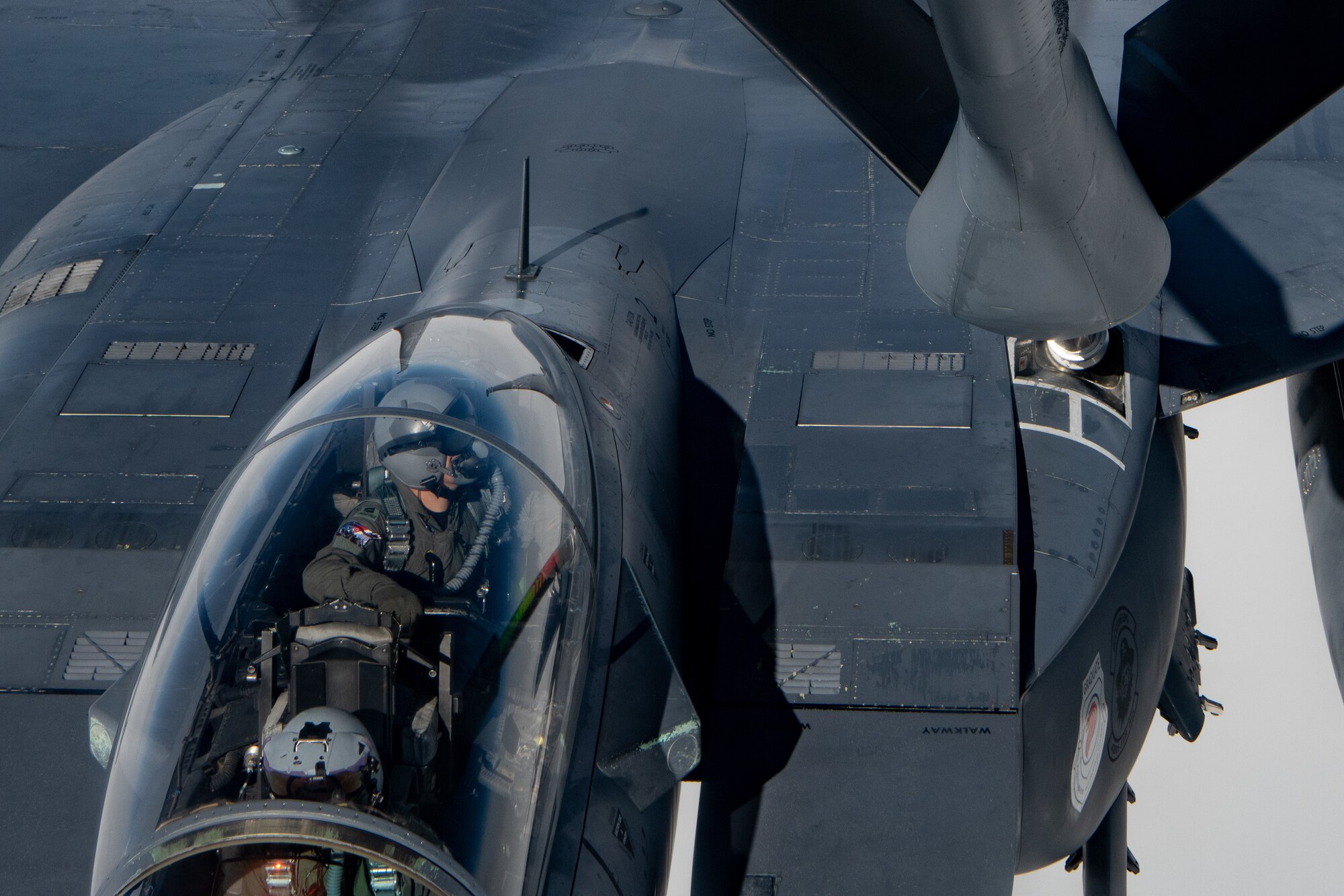 A Singapore jet performs aerial refueling.