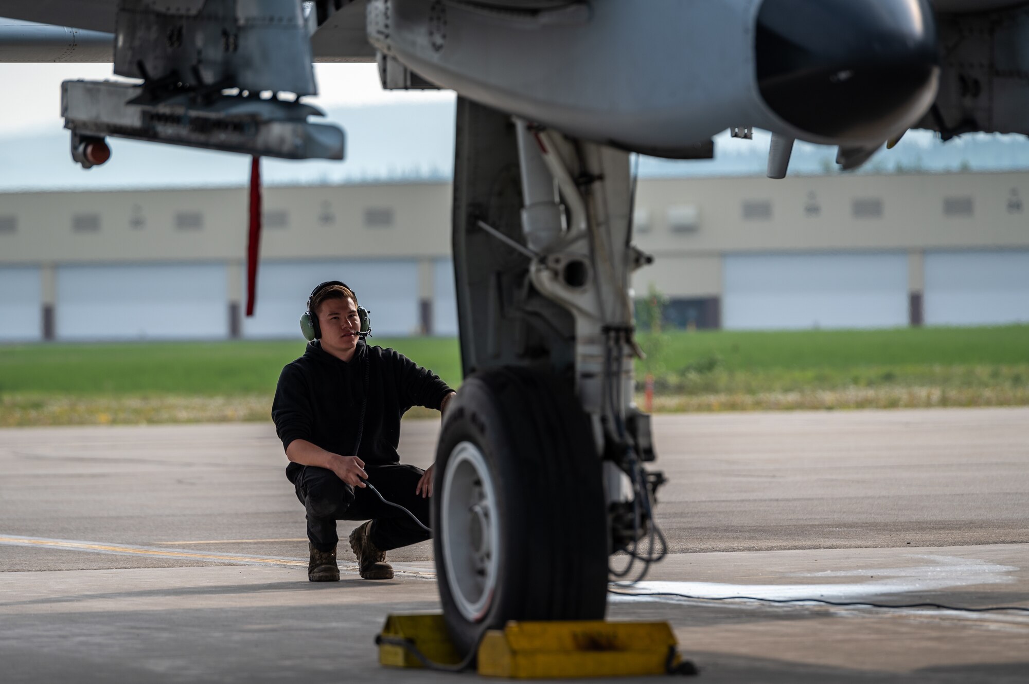 U.S. Air Force Staff Sgt. Jason Moore, 25th Fighter Generation Squadron crew chief, inspects the exterior of an A-10 Thunderbolt II