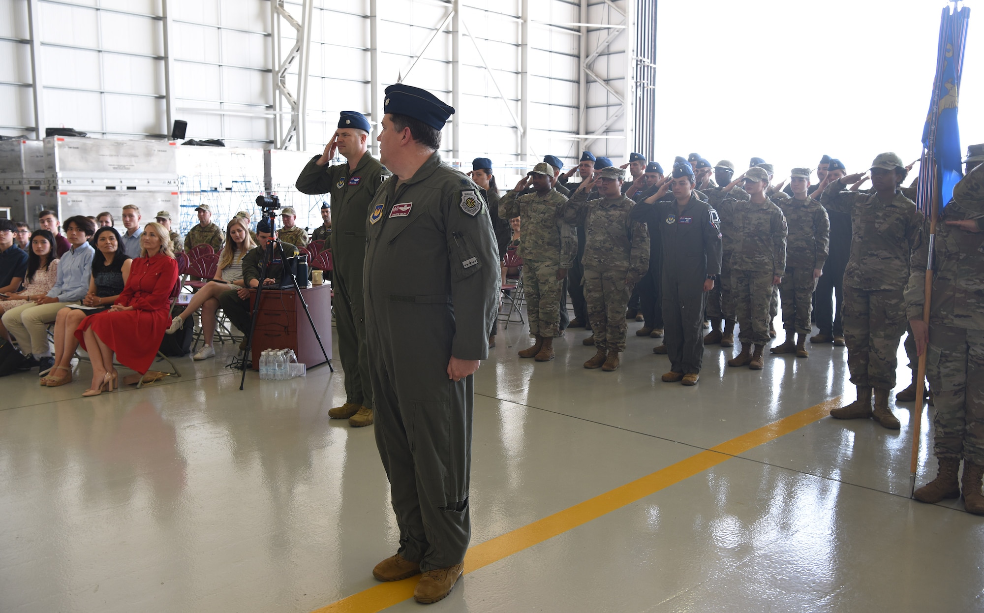 U.S. Air Force Airmen render a first salute to the new 100th Operations Group commander during a change of command ceremony at Royal Air Force Mildenhall, England, June 16, 2022. U.S. Air Force Col. Thomas Hutton, 100th OG commander, Hutton joins the 100th Air Refueling Wing from Ramstein Air Base, Germany, and is a command pilot with more than 3,000 flying hours in tanker and trainer aircraft. (U.S. Air Force photo by Karen Abeyasekere)
