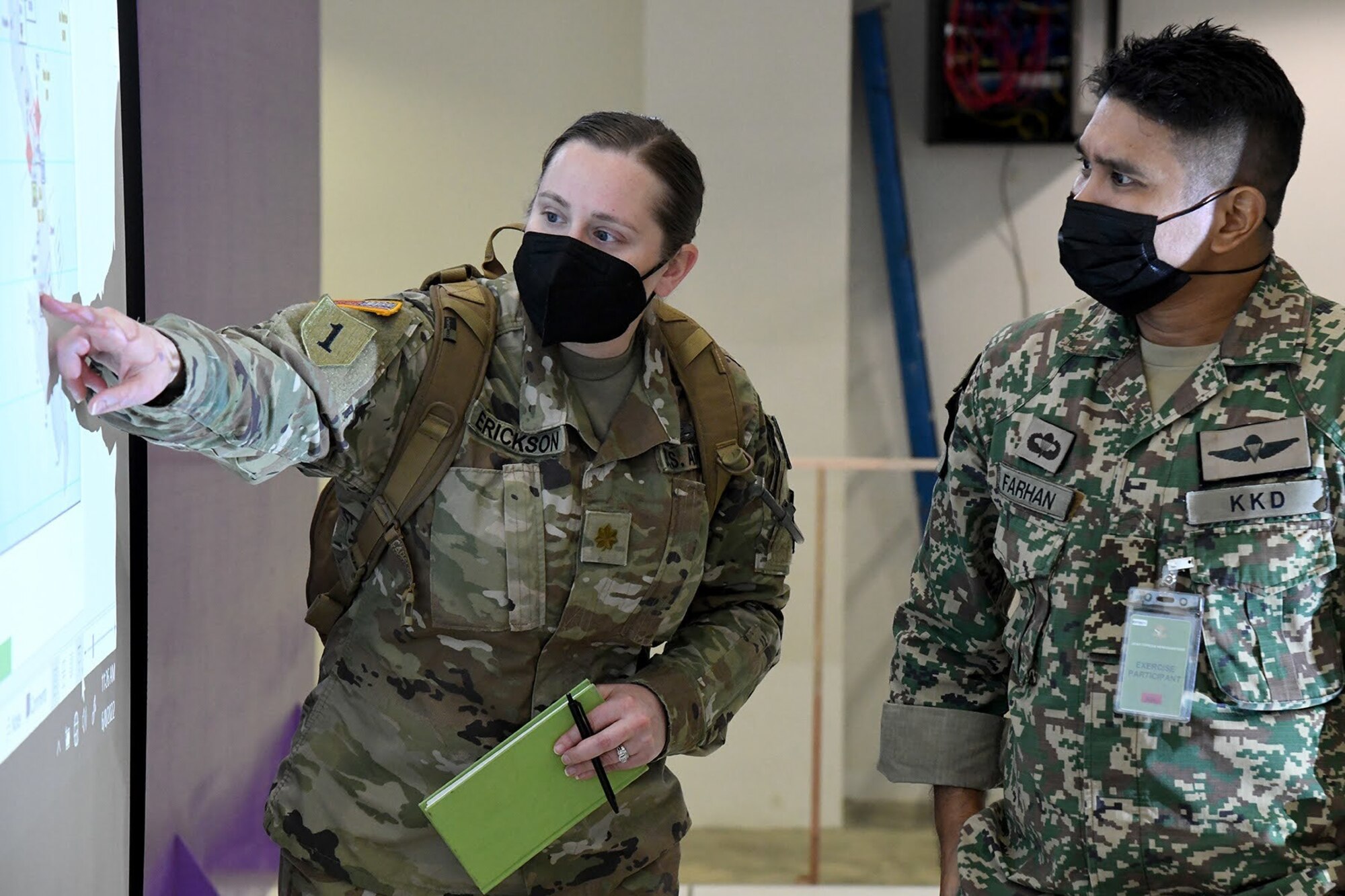 U.S. Army Maj. Jennifer Erickson, Bersama Warrior 2022 Surgeon, coordinates with her Malaysian Army counterpart during the eighth annual Bersama Warrior exercise in Kuantan, Malaysia, June 8, 2022.