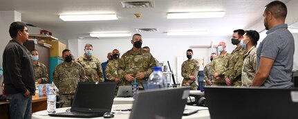 Brig. Gen. Jamison Herrera, deputy adjutant general, New Mexico National Guard, talks to the Cyber Innovative Readiness Training team during his visit to Mescalero Apache Telecom Inc. in Ruidoso, N.M., June 16, 2022. The New Mexico Air and Army Guard spent a week with their MATI counterparts focusing on cyber issues.