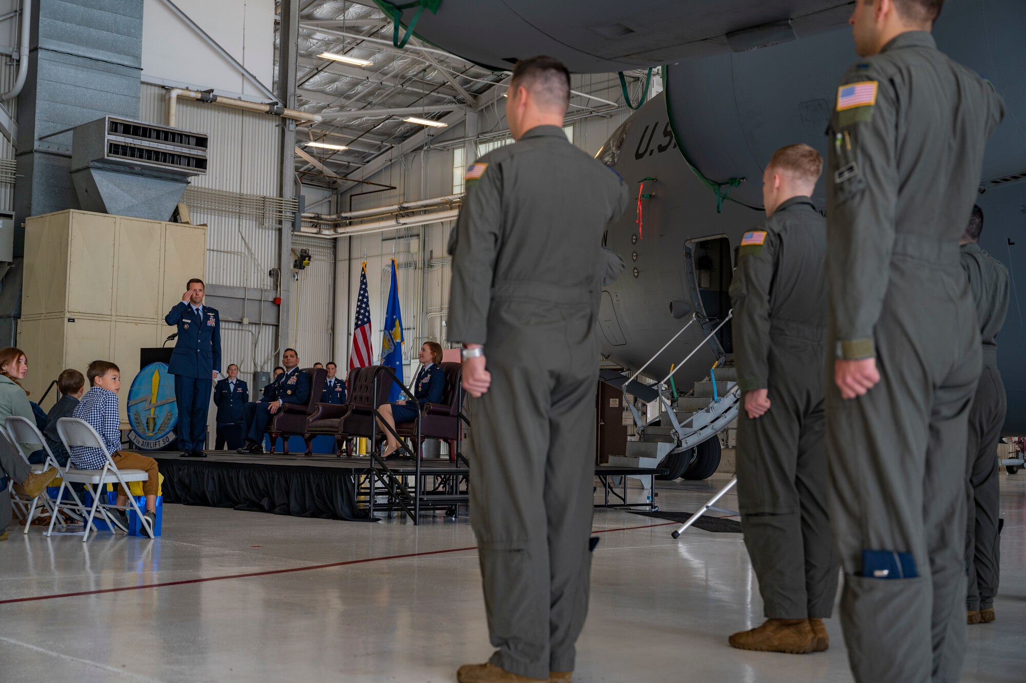 U.S. Air Force Lt. Col. Brandon Westling, incoming commander of the 7th Airlift Squadron, gives remarks during the change of command ceremony at Joint Base Lewis-McChord, Washington, June 16, 2022. Aircrews of the 7th AS operate the C-17 Globemaster III aircraft, directly supporting numerous U.S. government agencies and international forces in global operations ranging from troop airlift/airdrop to lifesaving medevac and humanitarian/disaster relief. (U.S. Air Force photo by Airman 1st Class Charles Casner)