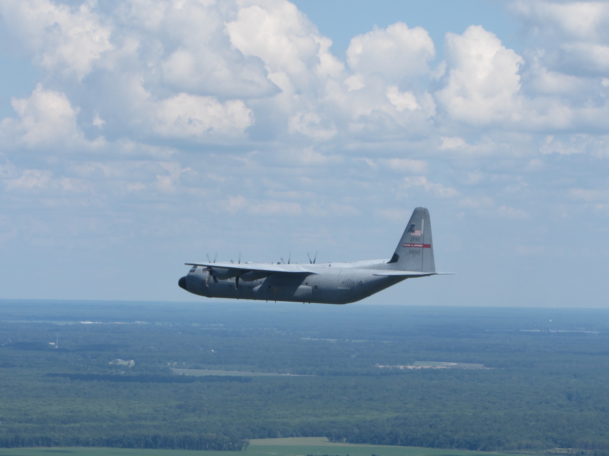 A C-130J Super Hercules assigned to 815th Airlift Squadron flies over a training area near Cape Canaveral, Fla.
