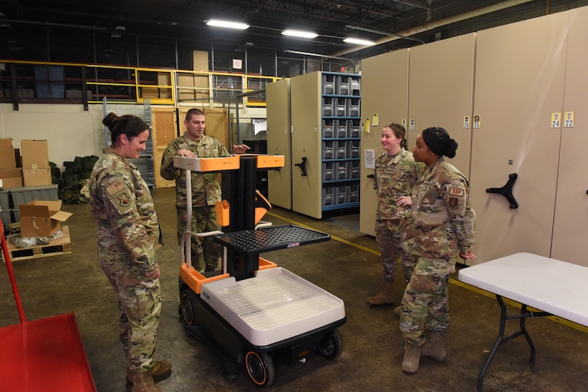 Pennsylvania Air National Guardsman Staff Sgt. Benjamin Bruce, a material manager with the 171st Air Refueling Wing’s Logistics Readiness Squadron, trains Louisiana Air National Guardsmen Staff Sgt. Julie Lobre, Airman 1st Class Emily Savoie and Staff Sgt. Robionne Reed on using a work assist vehicle June 14, 2022. The training is part of a partnership between the the 159th Fighter Wing’s Logistics Readiness Squadron and the 171st Air Refueling Wing. (U.S. Air National Guard Photo by Senior Master Sgt. Shawn Monk)