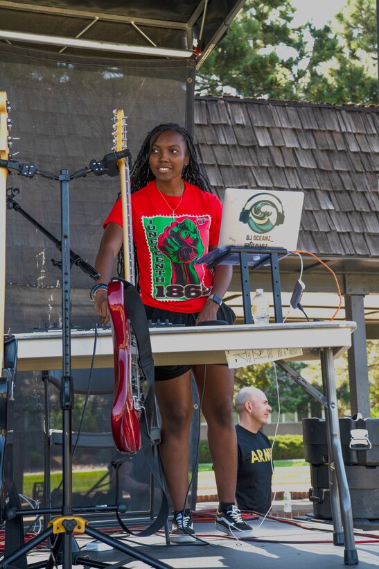 Musical guest DJ Oceanz, from Atlanta, G.A., plays music at the Juneteenth Festival, hosted at Patriot Park on Peterson Space Force Base, Colorado, June 16, 2022.