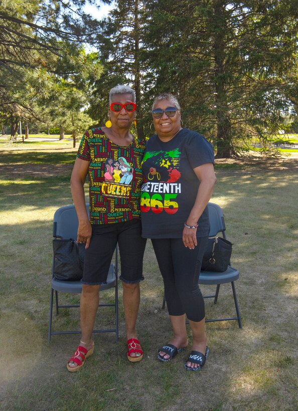 Attendees of the Juneteenth festival display their Juneteenth inspired clothing at Peterson Space Force Base, Colorado, June 16, 2022.