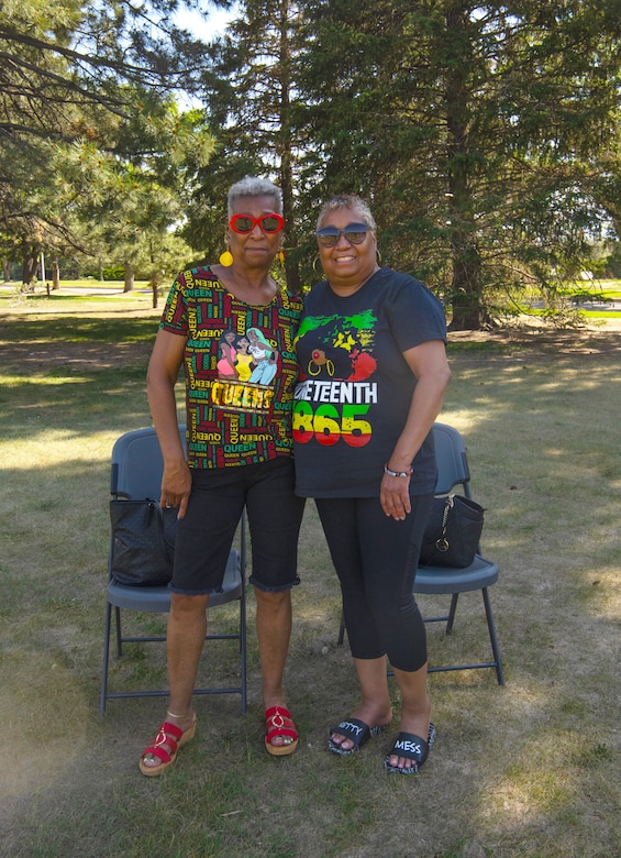 Attendees of the Juneteenth festival display their Juneteenth inspired clothing at Peterson Space Force Base, Colorado, June 16, 2022.