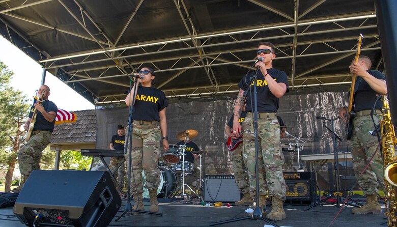 Live performers of the 4th Infantry Division Band, Fort Carson, Colorado, perform at the Juneteenth Festival at Peterson Space Force Base, Colorado, June 16, 2022.