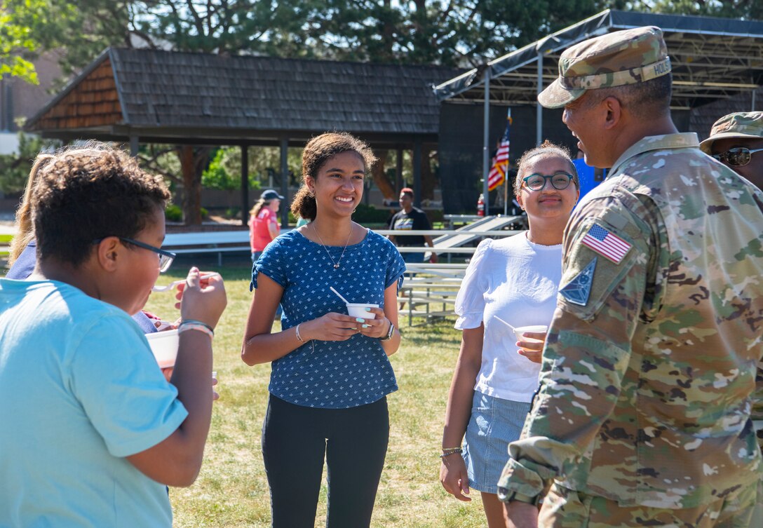 Family and friends gather during the Juneteenth Festival at Peterson Space Force Base, Colorado, June 16, 2022.