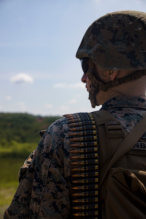 Barracks Marines with Alpha Company and Guard Company conducted M240B machine gun fire and subsequent squad support live-fire at Marine Corps Base Quantico, Va., June 15, 2022. The range consisted of training with the M240B machine gun, while suppressing fire and denying the enemy from establishing firing positions for their fire support assets. The training hones the Marines capabilities as a squad that is capable of responding to a potential crisis or contingency. (U.S. Marine Corps photo by Cpl. Mark Morales)
