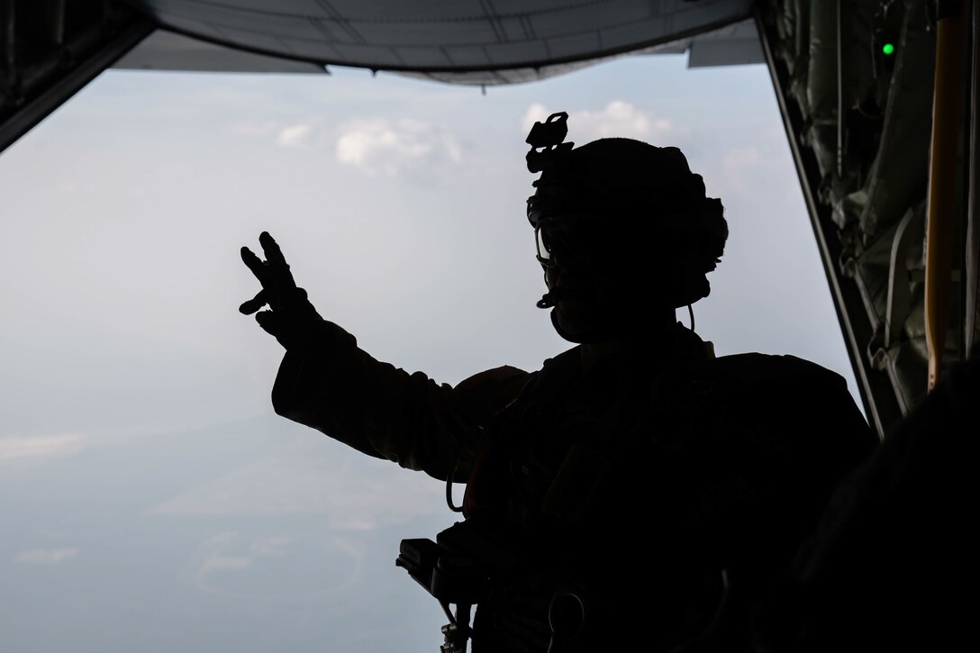 Photo of a U.S. Army 1st Special Forces Group team member preparing for a military free fall jump