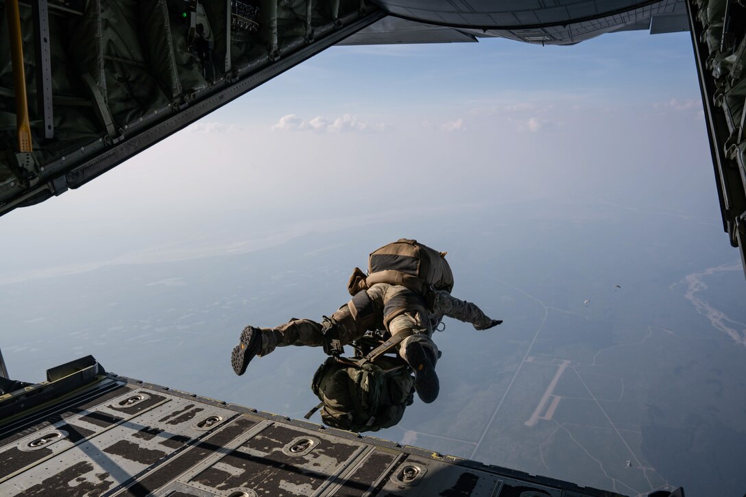 A U.S Army 1st Special Forces Group team member conducts a military free fall jump