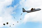 U.S. Air Force C-130 Hercules aircraft from the 130th Airlift Wing, McLaughlin Air National Guard Base, Charleston, West Virginia, perform an airdrop during Agile Combat Employment (ACE) training during Agile Rage 22, Alpena Combat Readiness Training Center, Mich., June 10, 2022. ACE is not a specific mission, but a universal application to all combat air force operations. ACE is the ability to project combat power anytime, anywhere, while remaining operationally unpredictable to complicate an adversary's decision making process. (U.S. Air National Guard photo by Master Sgt. David Kujawa)