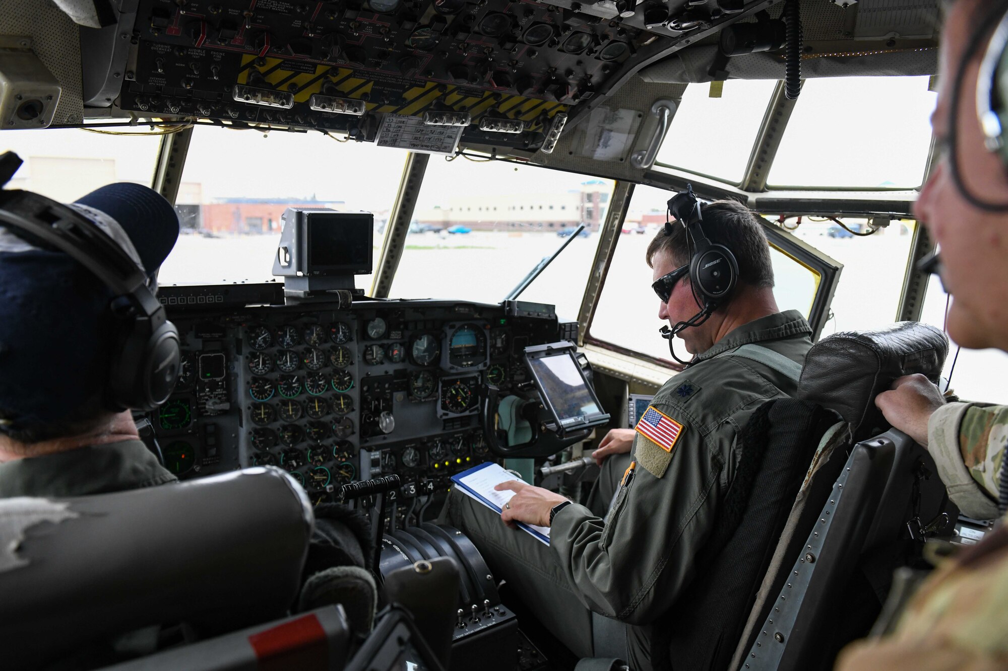 Wyoming Air National Guard flight crew perform preflight checks at Cheyenne Regional Airport, Cheyenne, Wyoming June 9, 2022. Pilots and crew performed the checks to ensure aircraft functionality and safety before flying. (U.S. Air Force photo by Airman 1st Class Landon Gunsauls)