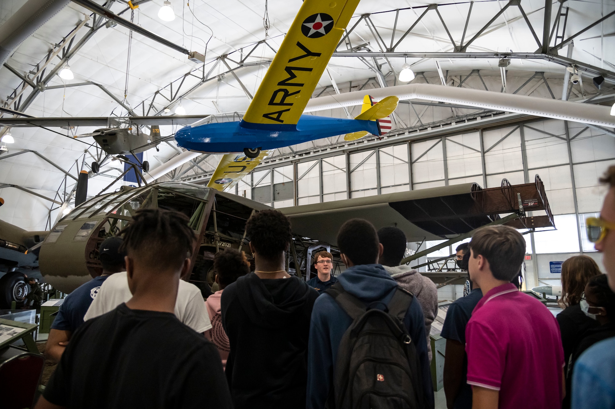 Students from the Organization of Black Aerospace Professionals tour historical exhibits at the Air Mobility Command Museum in Dover, Delaware, June 21, 2022. OBAP aims to motivate youth to become educationally prepared for life, increase minority participation in aerospace and increase the number of minority professionals in aerospace and related industries. (U.S. Air Force photo by Staff Sgt. Marco A. Gomez)