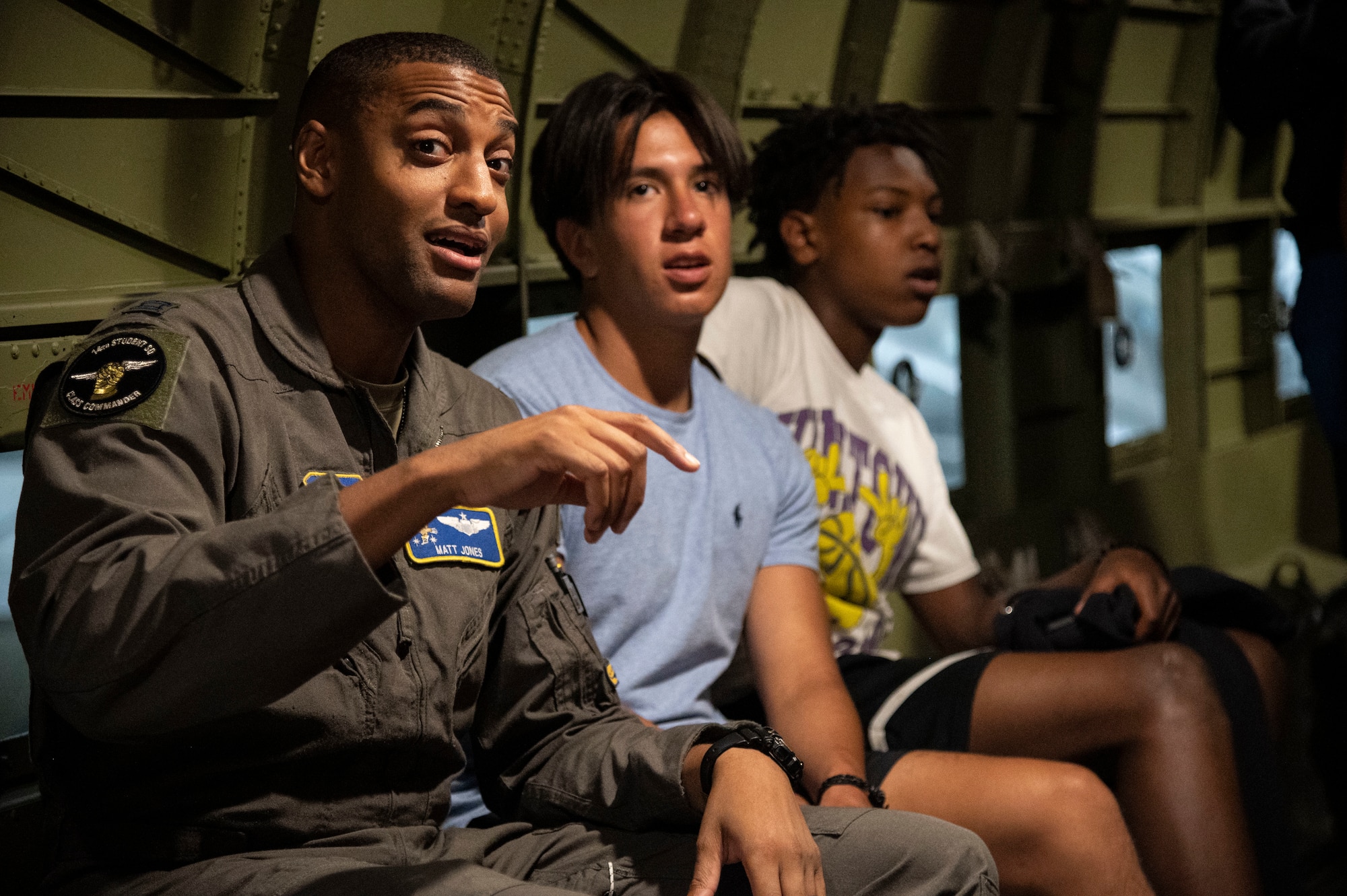 Capt. Matthew Jones, 14th Student Squadron T-6 instructor pilot, talks to students from the Organization of Black Aerospace Professionals during an immersion tour at the Air Mobility Command Museum in Dover, Delaware, June 21, 2022. Along with being the assigned group mentor, Jones gave students personal insight into the military lifestyle and his own experiences as a member of the aviation community in the Air Force. (U.S. Air Force photo by Staff Sgt. Marco A. Gomez)