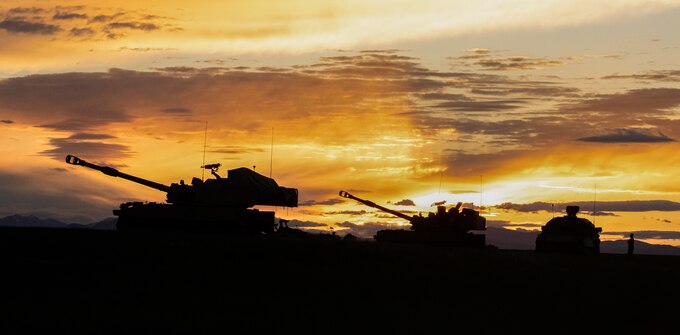 Gun crews from 2nd Battalion, 222nd Field Artillery Regiment, 65th Field Artillery Brigade, Utah Army National Guard, begin preparing their equipment for a day of fire missions as part of Western Strike 22 at Orchard Combat Training Center, Idaho, June 11, 2022.