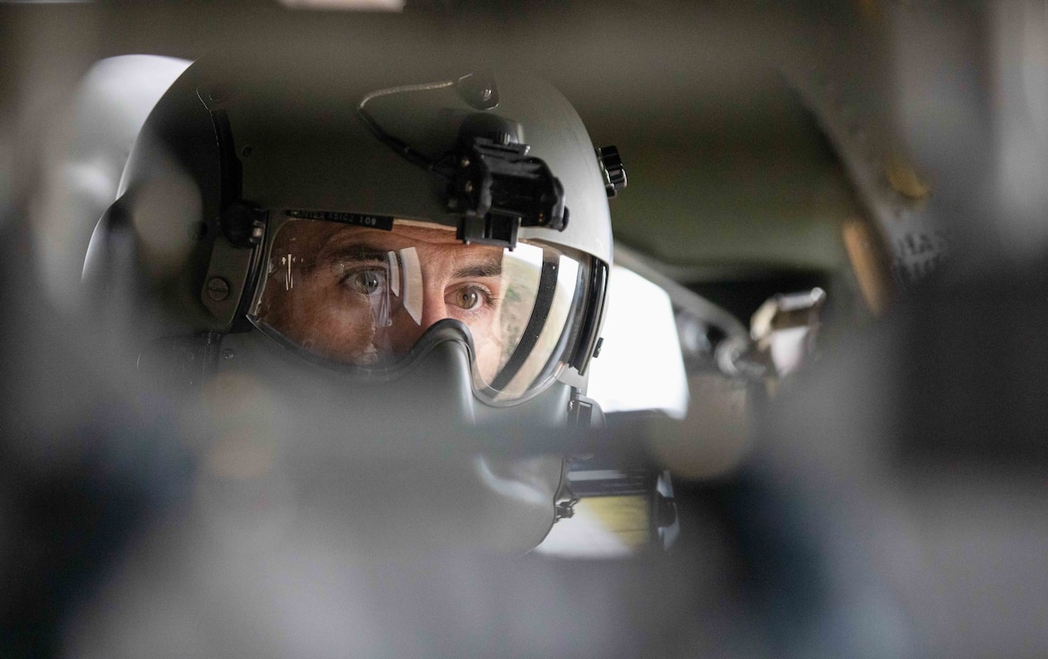 Sgt. Timothy Flowers, a crew chief with 2nd Battalion, 211 Aviation Regiment, Utah Army National Guard, helps clear the airspace for the High Mobility Artillery Rocket System during Western Strike 22 at Orchard Combat Training Center, Idaho, June 4, 2022.