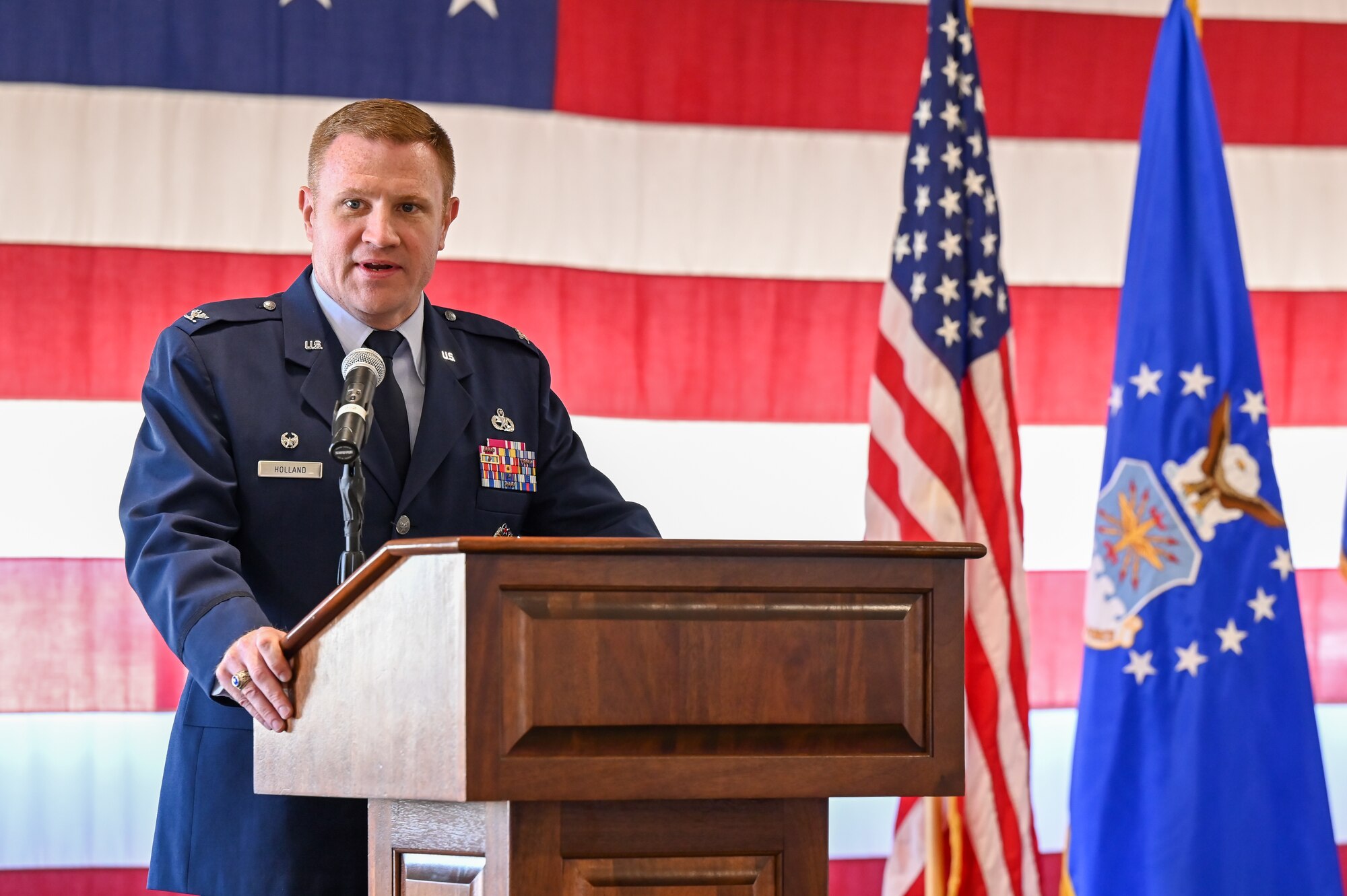 Col. Jeffrey G. Holland, incoming 75th Air Base Wing commander, speaks during a change of command ceremony June 22, 2022, at Hill Air Force Base, Utah