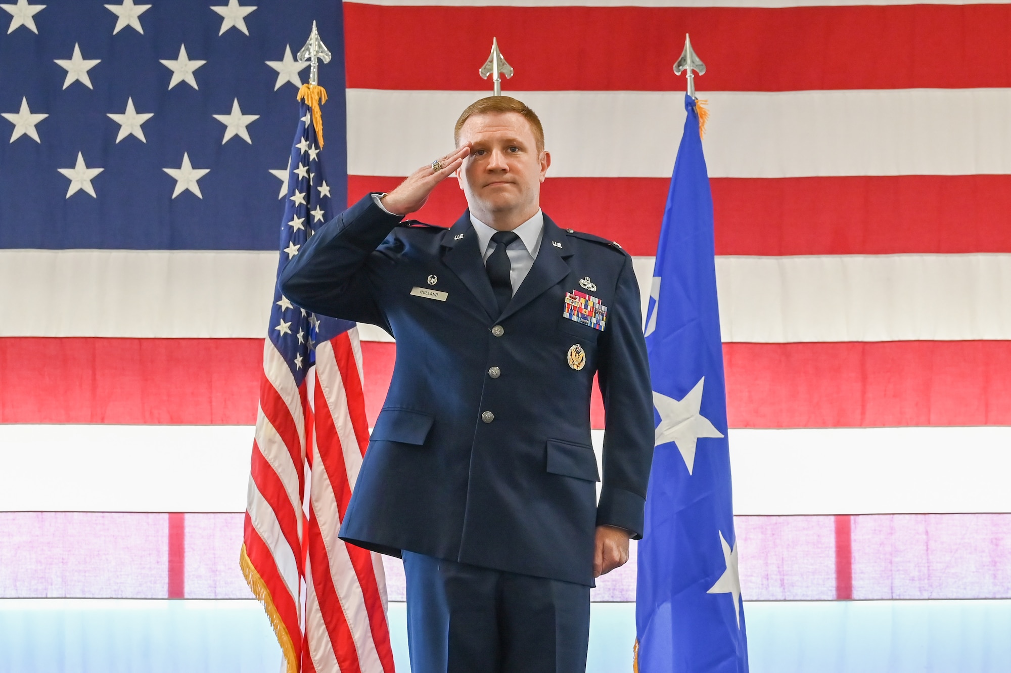 Col. Jeffrey G. Holland, incoming 75th Air Base Wing commander, renders his first salute to the wing during a change of command ceremony June 22, 2022, at Hill Air Force Base, Utah.