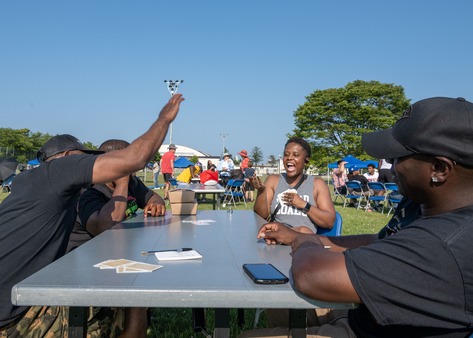 Members from Team Misawa participate in a spades tournament during the Juneteenth Family Reunion event at Misawa Air Base, Japan, June 18, 2022.