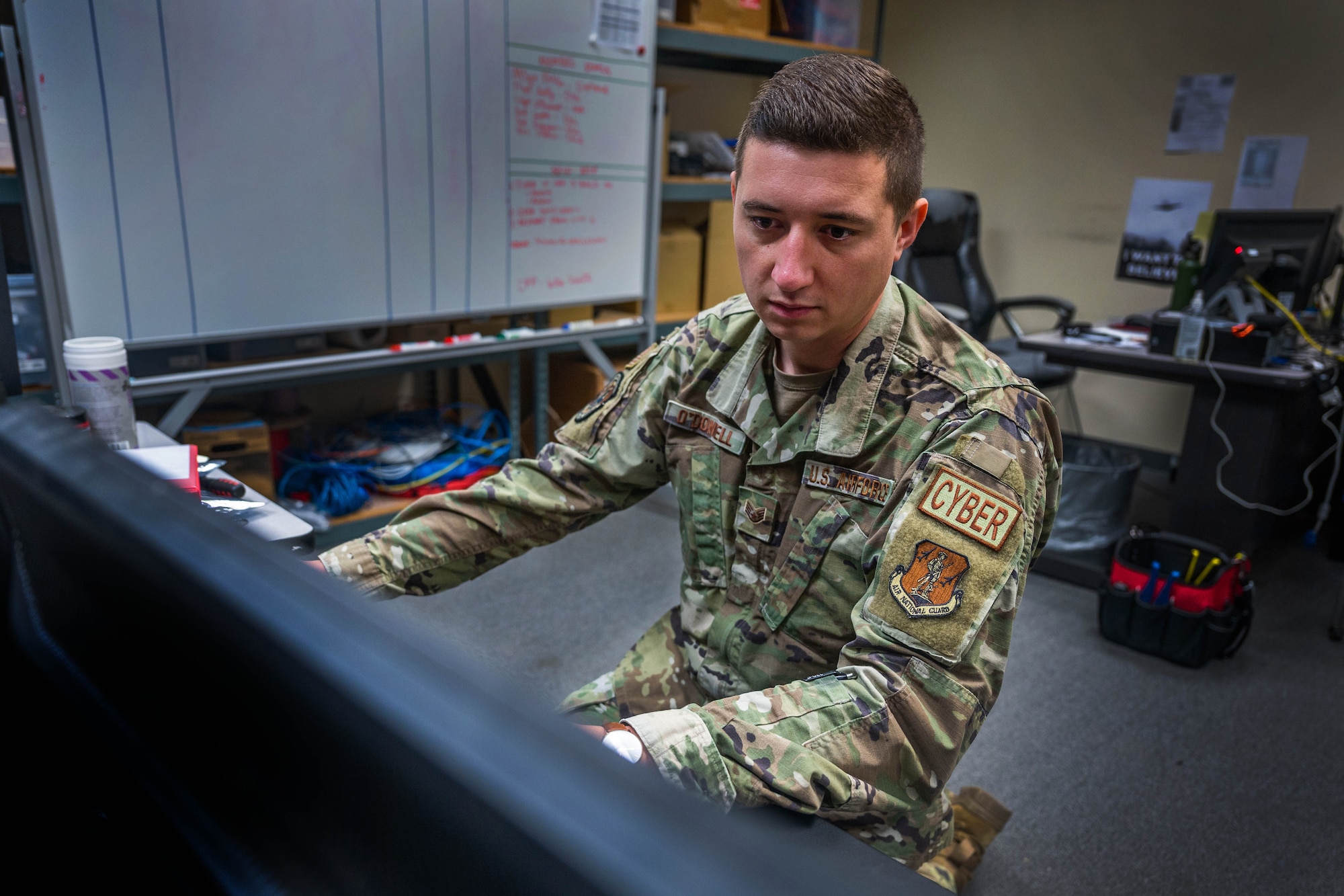 U.S. Air Force Staff Sgt. James O’Donnell, 216th Space Control Squadron information systems security officer (ISSO), works at a computer June 22, 2022, at Vandenberg Space Force Base, Calif. According to O’Donnell, there are over 1500 controls that are set forth by the National Institute for Standard Technology (NIST) and a requirement to explain in detail how they are meeting each control. (U.S. Space Force photo by Tech. Sgt. Luke Kitterman)

“My job is to make sure the weapons system is secure,” said O’Donnell. “When you are dealing with a weapons systems that is this high of a security level, there are a lot of requirements levied on us by higher headquarters. If we don’t meet those, we don’t operate.”