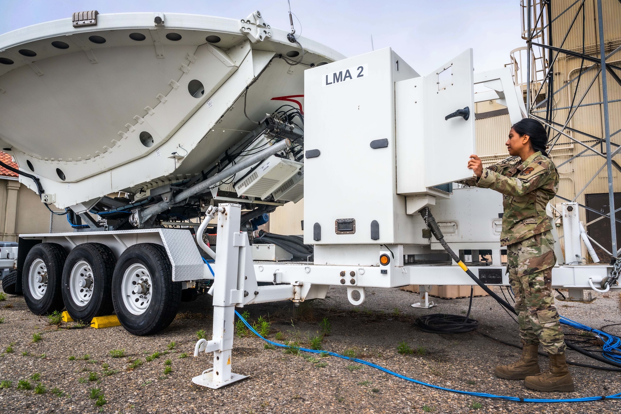 U.S. Air Force Senior Airman Esmeralda Sanchez Avila, 216th Space Control Squadron (SPCS) radio frequency transmission specialist, looks over an the large multi-band antenna (LMA) June 22, 2022, at Vandenberg Space Force Base, Calif. Sanchez Avila has been with the 216 SPCS since 2018 and maintains the weapons systems through preventative maintenance inspections, antenna mobility checks, system cleanliness, and all the pieces of the LMA are working properly. (U.S. Space Force photo by Tech. Sgt. Luke Kitterman)  

“We have ‘space’ in our unit’s name and most people associate that with the operators but I don’t think anyone has such a closer relationship to the system as us,” said Sanchez Avila. “We know the ins and outs of the equipment and antennas—how to set them up, tear down, keep them clean and we are the ones that fix the issues to get the system working again. I take great pride in what I do because I know what I do directly effects boots on the ground.”