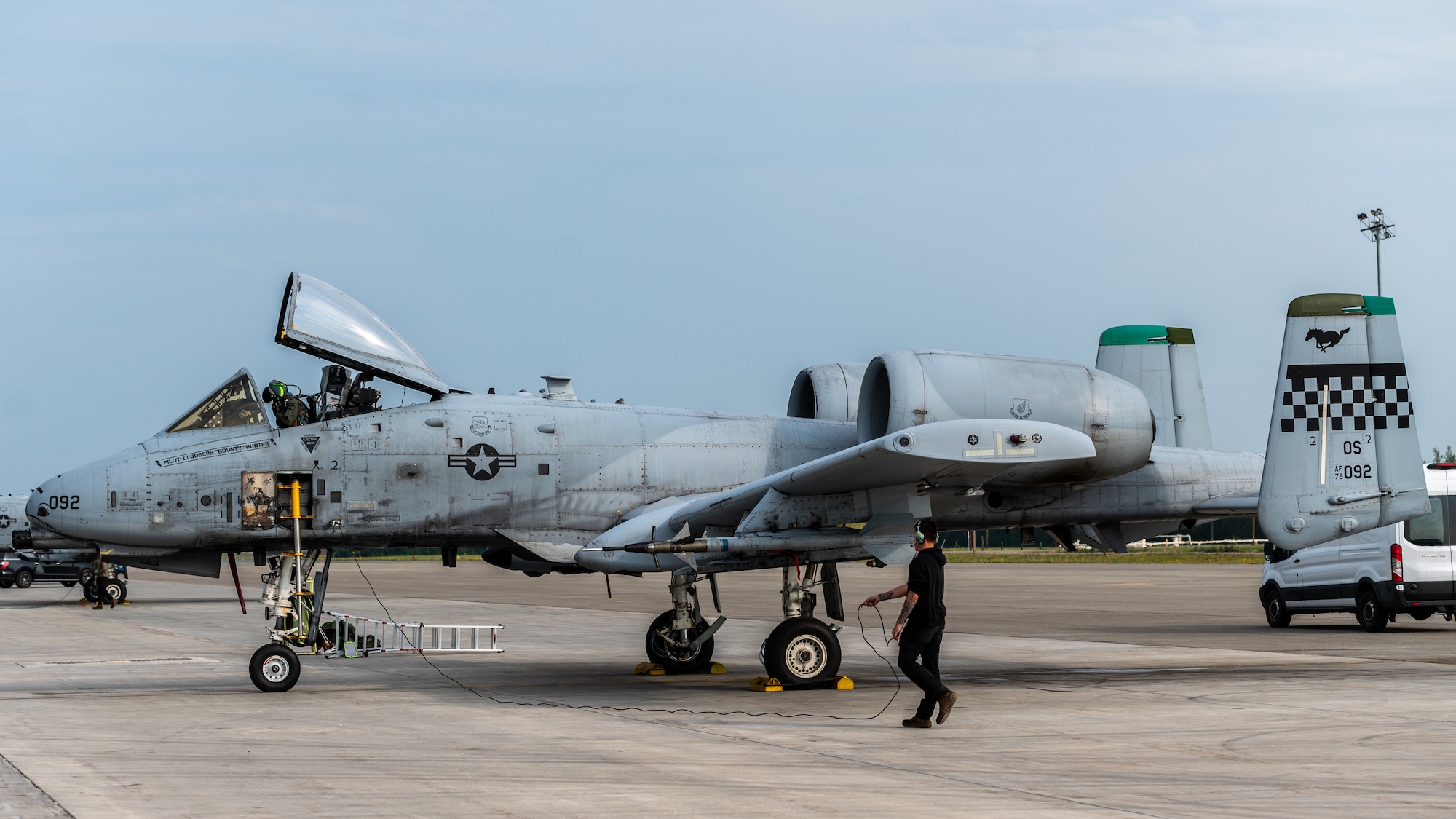 U.S. Air Force Capt. Colleen “Cloud” Engelbrecht, 25th Fighter Squadron pilot, and Staff Sgt. Jason Moore, 25th Fighter Generation Squadron crew chief, performs A-10 Thunderbolt II preflight procedures