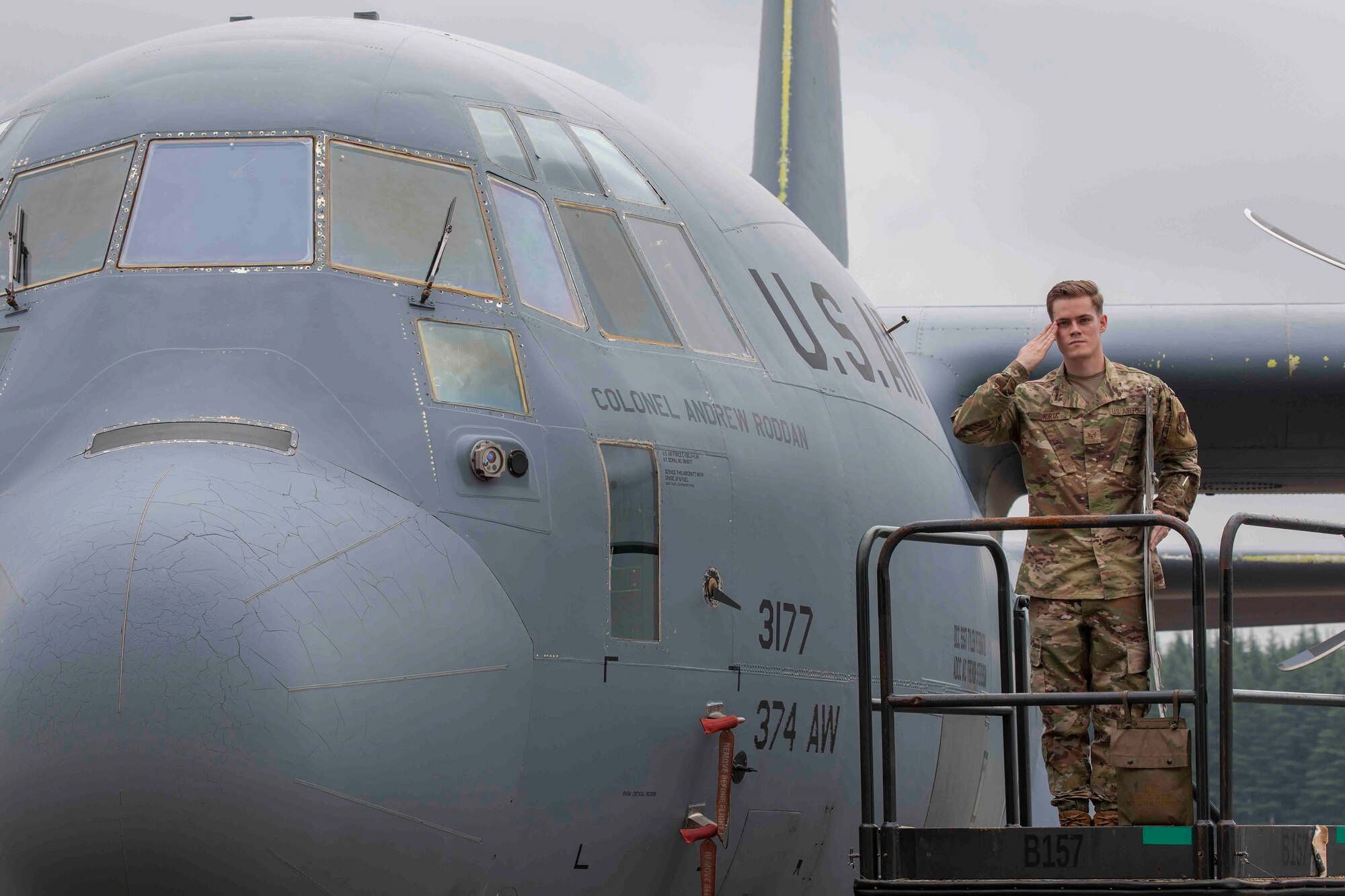 A U.S. Air Force Airman salutes