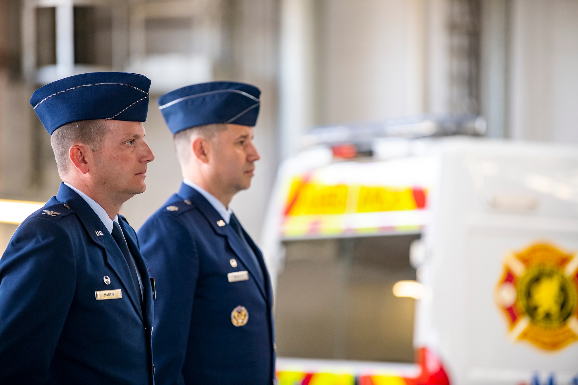 U.S. Air Force Col. Richard Martin, left, 423d Air Base Group commander, along with Lt. Col. Hans Winkler, 423d Civil Engineer Squadron commander, stand at attention during a change of command ceremony at RAF Alconbury, England, June 22, 2022. During the ceremony, Winkler relinquished command of the 423d CES to Lt. Col. Kevin Mckinley. (U.S. Air Force photo by Staff Sgt. Eugene Oliver)
