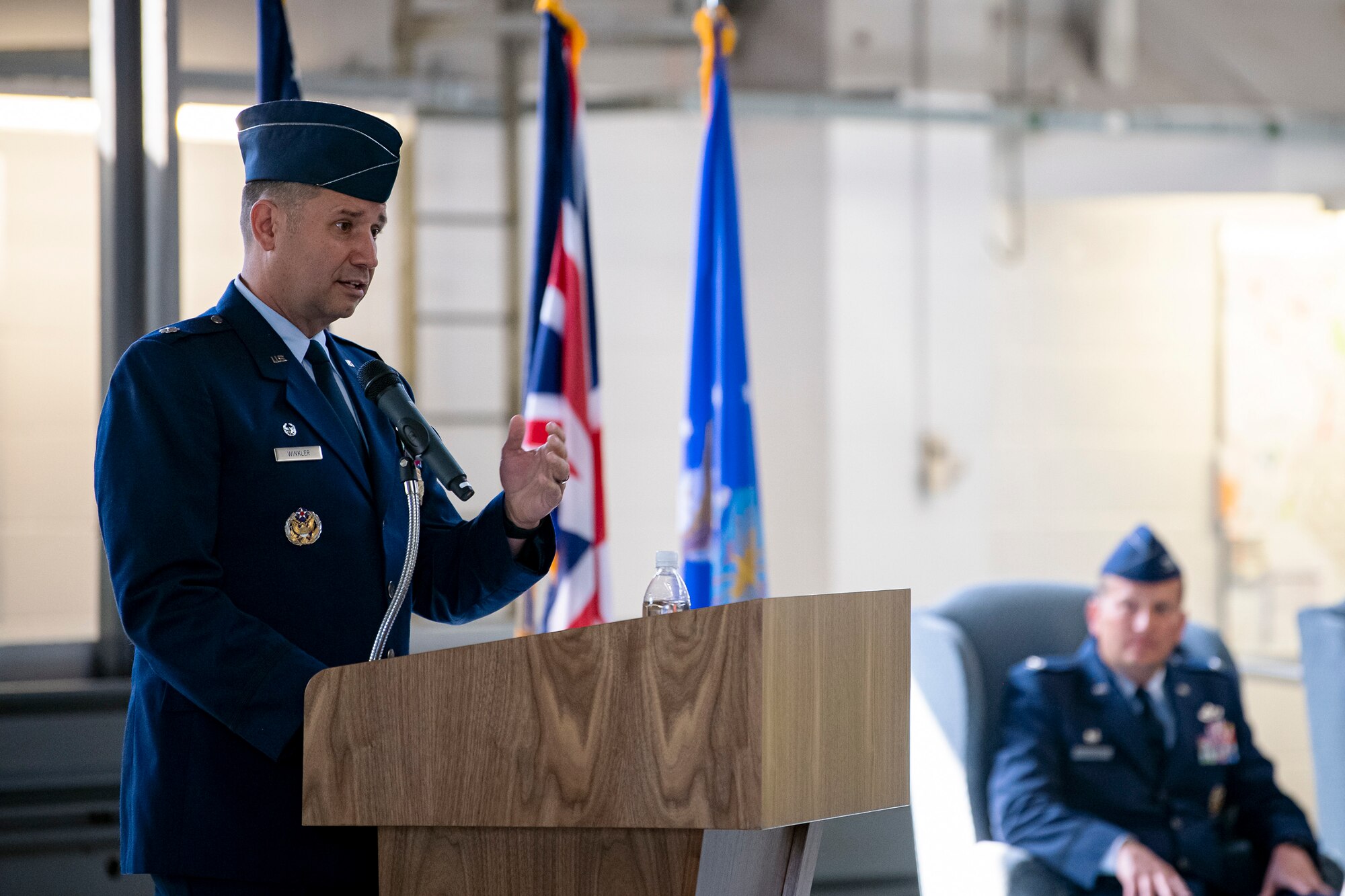 U.S. Air Force Lt. Col. Hans Winkler, 423d Civil Engineer Squadron commander, speaks during a change of command ceremony at RAF Alconbury, England, June 22, 2022. During his command, Winkler led a multinational workforce of 196 military and civilian personnel in the sustainment, maintenance, repair, fire protection and emergency services for 697 facilities across a two-installation and 916 acre complex. (U.S. Air Force photo by Staff Sgt. Eugene Oliver)