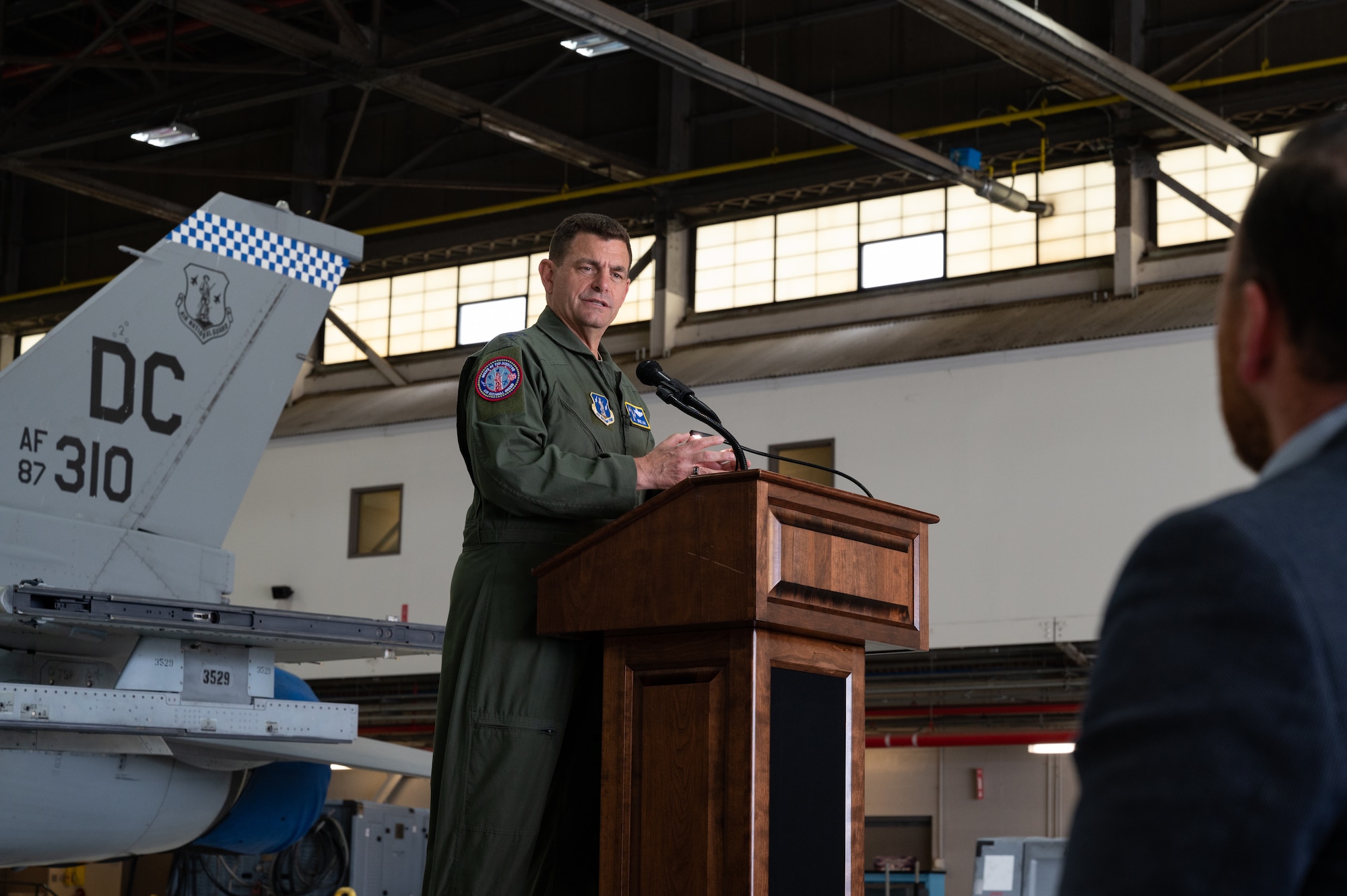 U.S. Air Force Lt. Gen. Michael A. Loh, director, Air National Guard, gives a commemoration speech about the APG-83 Active Electronically Scanned Array radar now equipped on F-16 Fighting Falcon aircraft assigned to 113th Wing, District of Columbia National Guard, on Joint Base Andrews, Maryland, June 9, 2022.