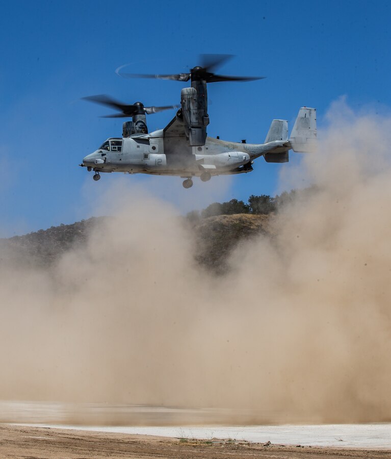 An MV-22B Osprey from Marine Medium Tiltrotor Squadron 164, Marine Aircraft Group 39, 3rd Marine Aircraft Wing (MAW), arrives at Vandenberg Space Force Base, California, June 16, 2022. The aircraft landed on an airfield repaired by Marine Wing Support Squadron 372, Marine Air Control Group 38, 3rd MAW, to demonstrate the Marine Corps’ self-sufficiency in austere environments. (U.S. Marine Corps photo by Cpl. Rachaelanne Woodward)