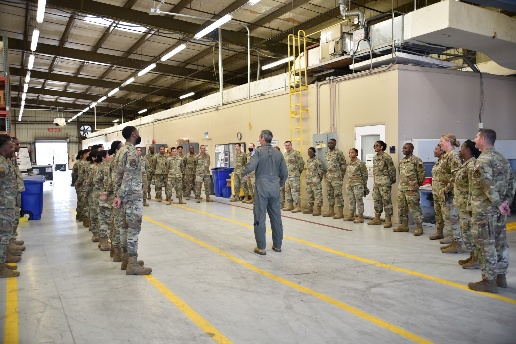Maj. Gen Bryan R. Radliff (center), 10th Air Force commander, addresses 301st Fighter Wing Logistics Readiness Airmen at Naval Air Station Joint Reserve Base Fort Worth, Texas, June 5, 2022. Radliff toured the 301 FW from June 3-5 to provide insight to Airmen about the future of the Air Force Reserve and leadership’s priorities.(U.S Air Force photo by Senior Airman William Downs)